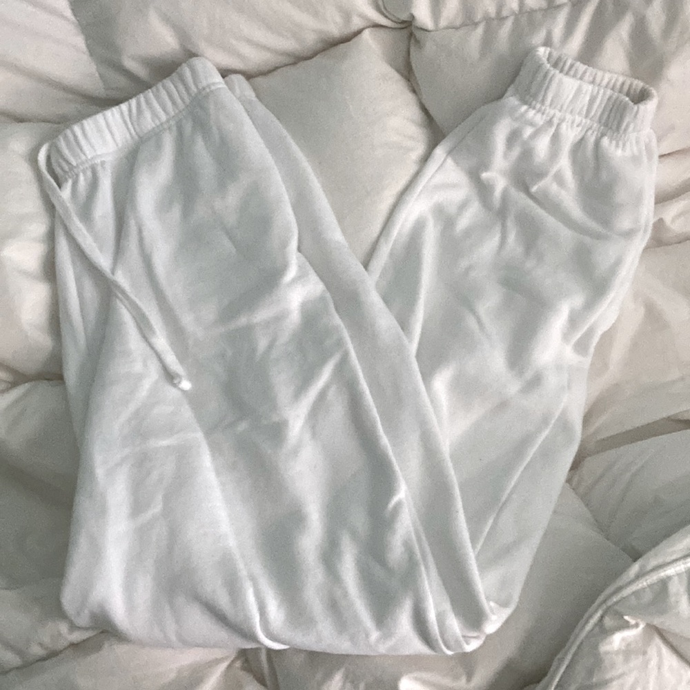 White high-rise Garage sweatpants.